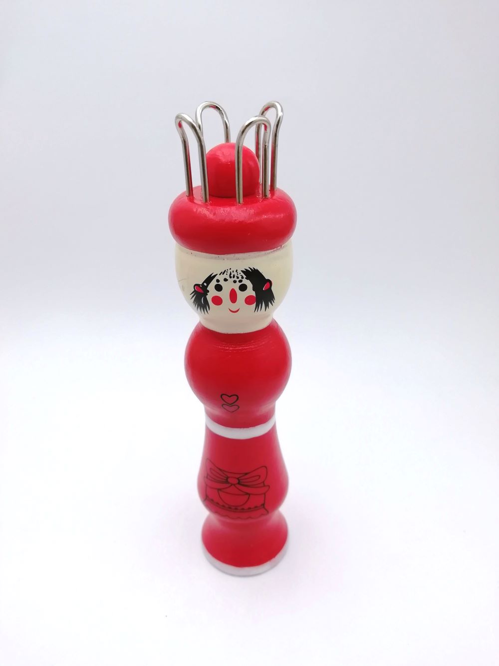 Colorful wooden knitting doll
