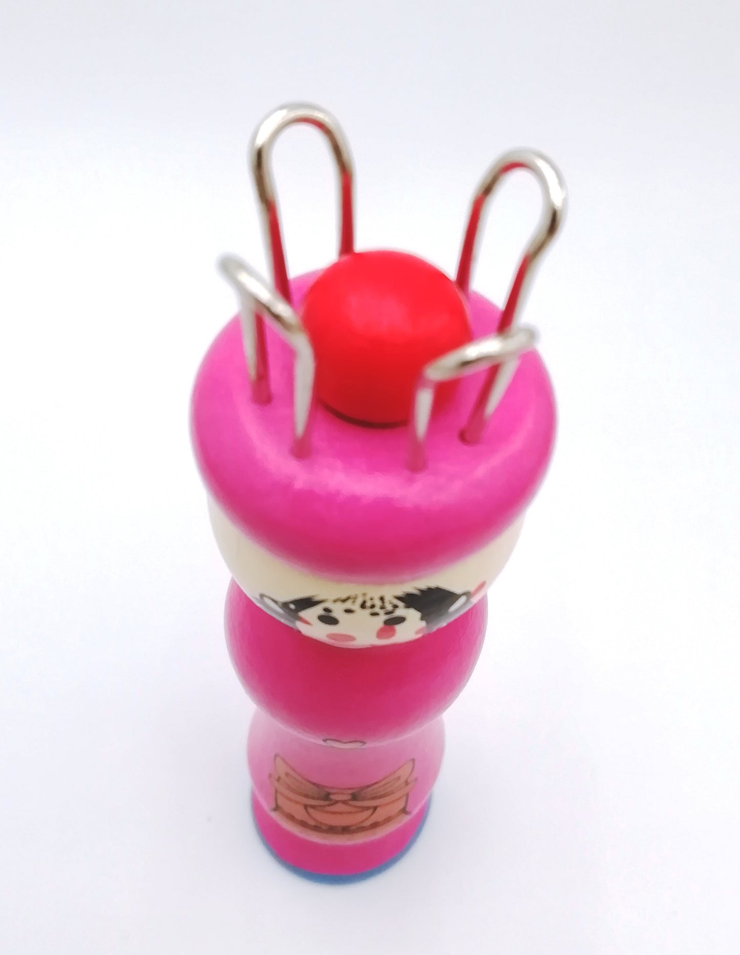 Colorful wooden knitting doll