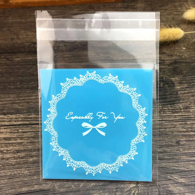 100PCS OPP Plastic Package Lovely Bowknot Design for Bracelets Earrings Necklace Rings DIY Jewelry Making 7 X 7cm